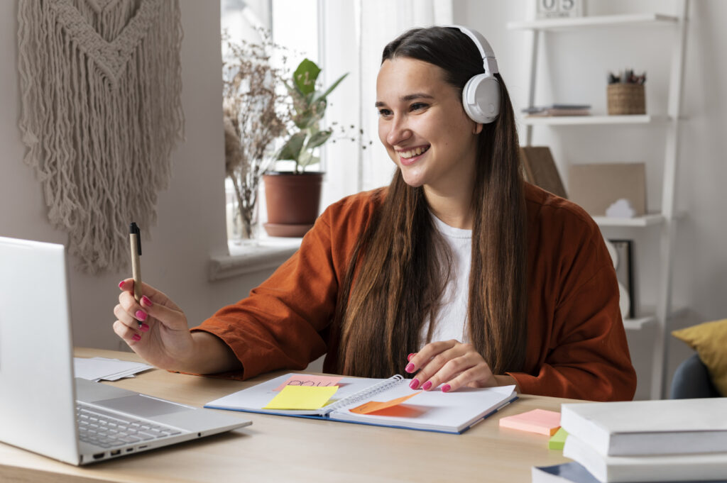 Student following online Dutch conversation lessons from her living room.
