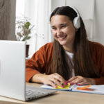 Cheerful student learning A1 Dutch online
