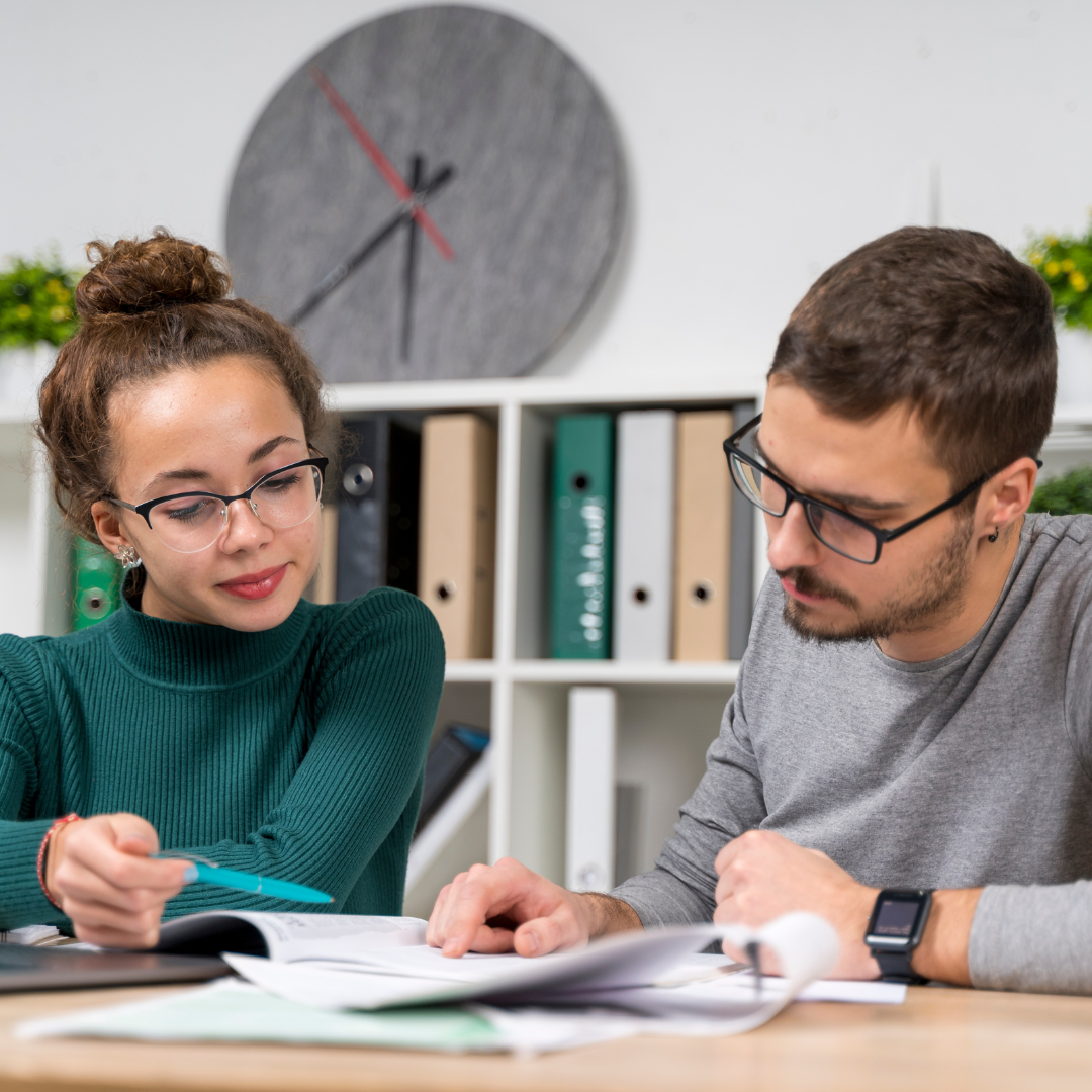 Dutch tutor and student during the test lesson in an office.
