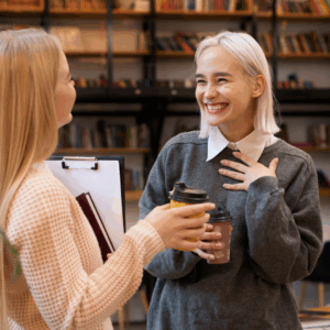 Dutch tutor meeting up with her student in an Amsterdam library for one of their in-person Dutch lessons.