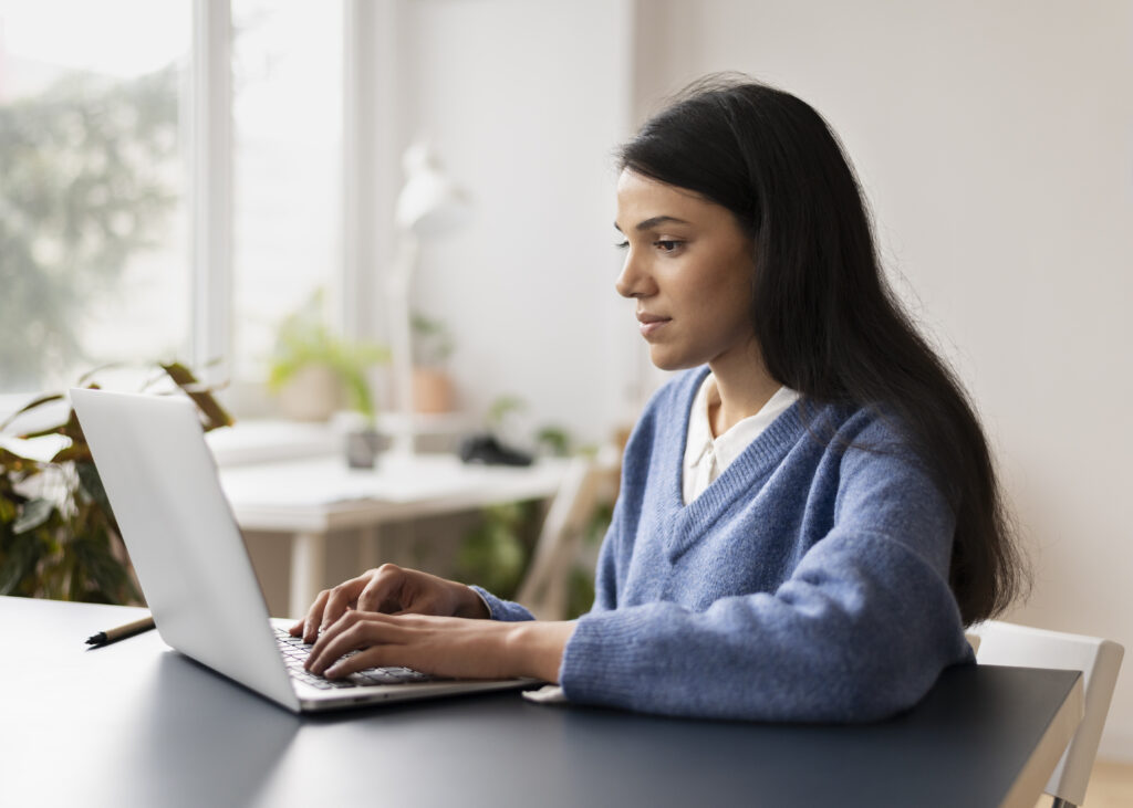 Female expat following an online class to prepare herself to take the Dutch A2 exam before the rules change.